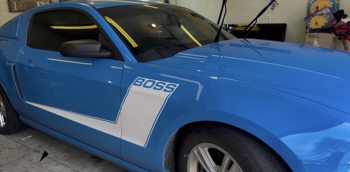 Blue Ford Mustang Boss with window tint
